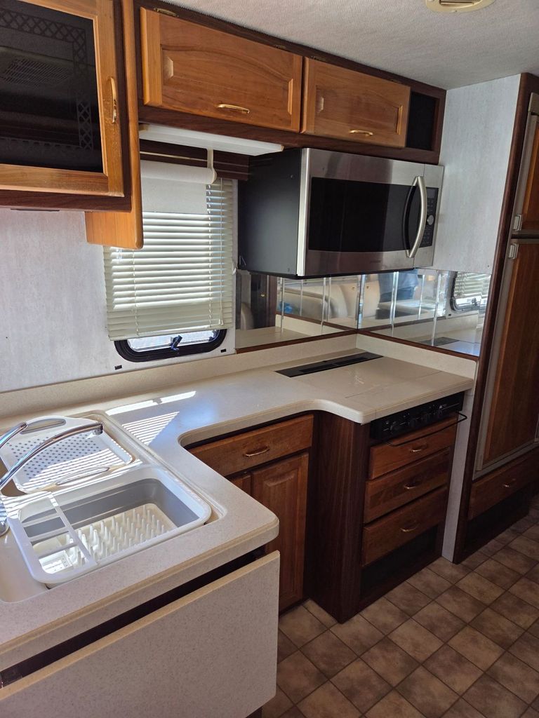 1999 National RV Tropical 6330 - National Vehicle