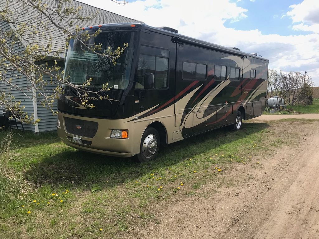 マコ 2012 Winnebago Vista LX 35F - National Vehicle