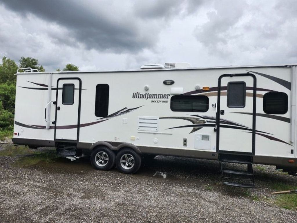 サン 2014 Forest River Rockwood Windjammer 2809W - National Vehicle